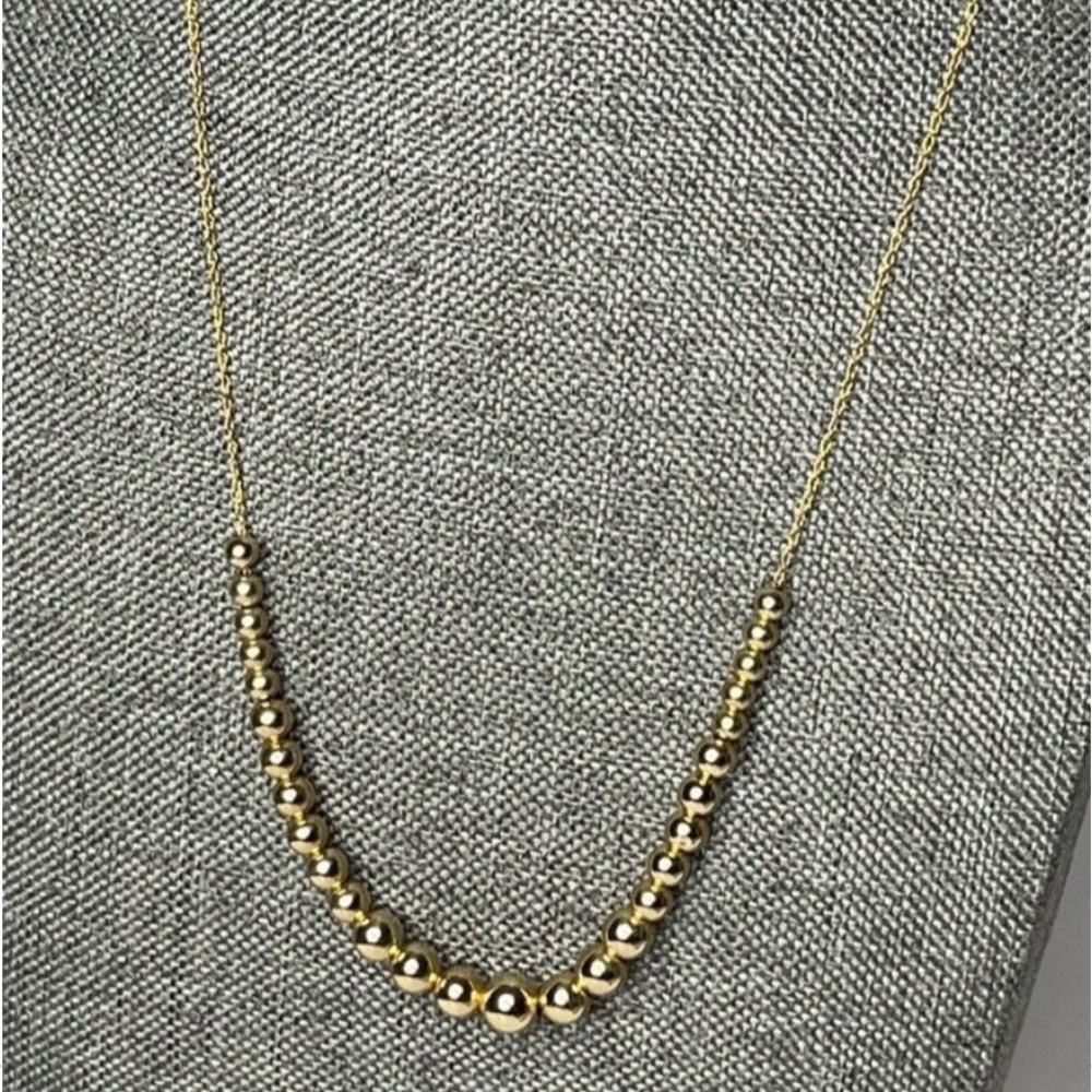 Add a bead necklace